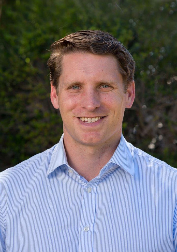 Portrait image of a caucasian man in a dress shirt